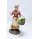 DONNA CON CESTA DI VERDURE
