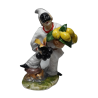 pulcinella con ceste di uva e limoni