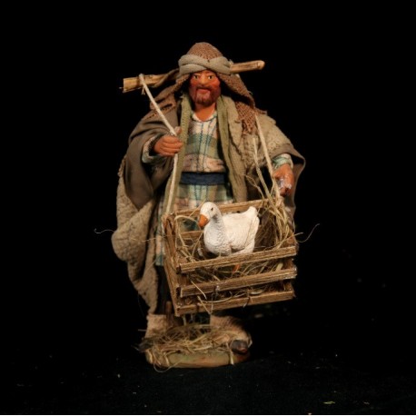 Uomo con oca nella gabbia