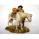 Pastore che sella cavallo